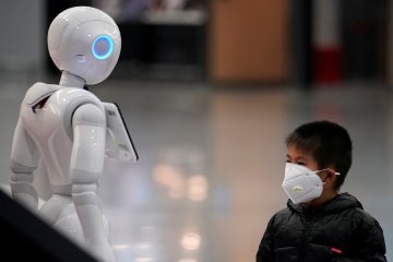 Promobot, robot berwajah ramah virus corona yang telusuri Times Square