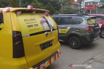 Maxim kenalkan layanan sewa dan derek mobil