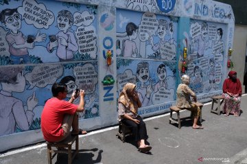 Mural anti hoaks di Kampung Hepi