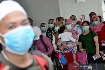 Kedatangan TKI dari Malaysia di bandara Kualanamu