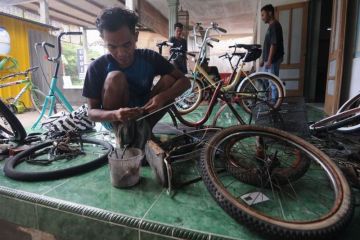 Restorasi sepeda bekas minion