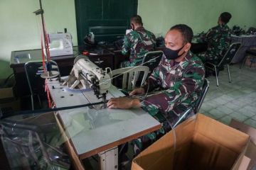 Produksi penutup wajah