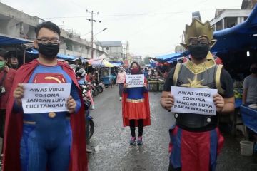 Ketika Superhero beraksi di pasar membasmi Corona