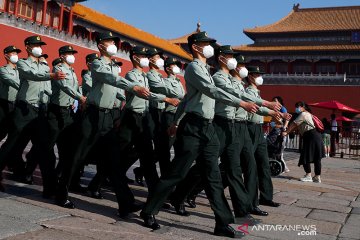 19 polisi di China dipecat
