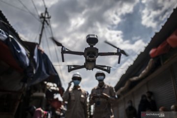 Pengukuran suhu tubuh mengunakan drone