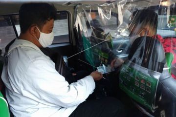 Fasilitas separator layanan ojek daring