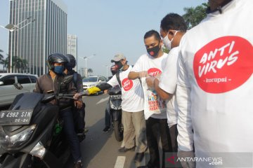 Kampanye anti virus korupsi melalui masker