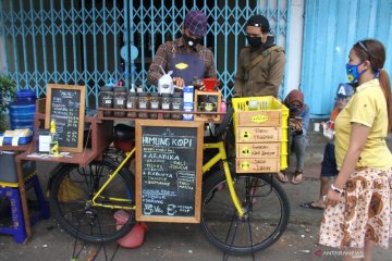 Pemanfaatan sepeda kayuh sebagai kafe mini
