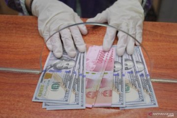 Rupiah menguat didukung arus modal asing dan neraca dagang