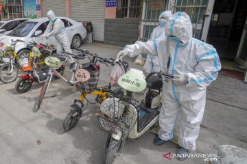 Perangkat masyarakat Uighur bentuk tim layanan antar barang di tengah pandemi