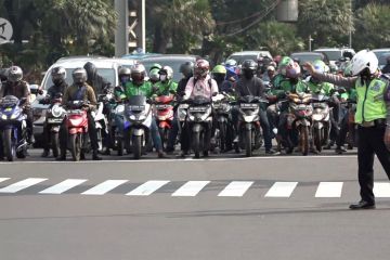 Suasana jalan MH Thamrin di hari pertama penerapan kembali ganjil genap