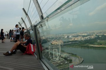 Singapura sambut wisatawan, berapa harga tiket pesawatnya?