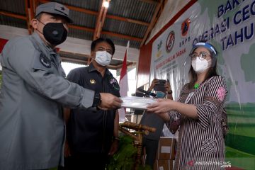 BAKAMLA DISTRIBUSIKAN BANTUAN COAVID-19 DI SANGIHE