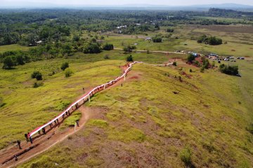 PEMBENTANGAN BENDERA MERAH PUTIH 200 METER DI HARI SUMPAH PEMUDA