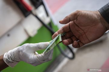 Foto Cerita : Tetap Melayani