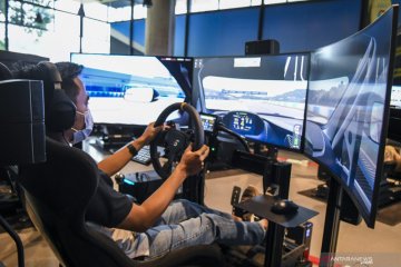 Menjajal simulator balap mobil IMI