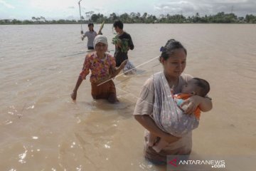 PENGUNGSI BANJIR DI BANYUMAS PILIH PULANG