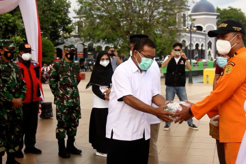 Kemenko PMK salurkan bantuan masker kepada Satgas COVID-19 Malut