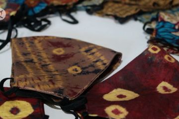 Masker motif Jumputan, peluang usaha dari kain khas Palembang