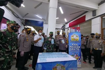 Kios masker gratis didirikan di Stasiun Kota