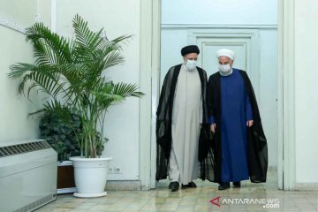 Pertemuan Presiden Rouhani dengan presiden terpilih Ebrahim Raisi