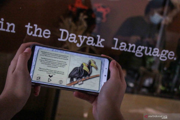 Aplikasi buku cerita digital tentang Owa Kalimantan