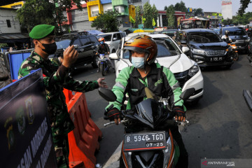 Polisi prioritaskan ojek daring lewati pos penyekatan meski tanpa STRP