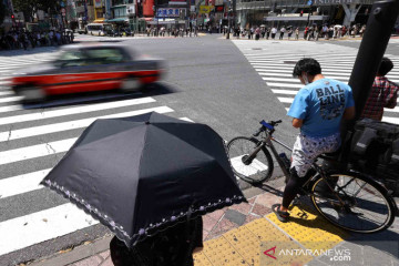 Kesibukan warga Kota Tokyo satu minggu menjelang pembukaan Olimpiade