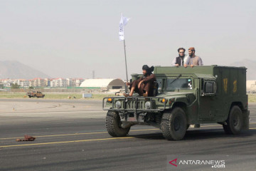 Taliban kepung penentangnya dan serukan perdamaian