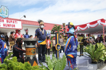 Papua PON: People cheer Torch Relay in Biak Numfor