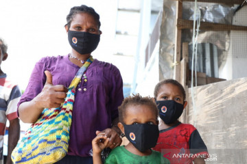 Relawan Mobil Masker gencar bagikan masker jelang PON Papua