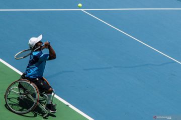 Tenis lapangan kursi roda Peparnas - tunggal elite masuki semi final