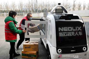 Kendaraan pengiriman nirawak beroperasi di Xi'an