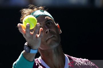Aksi Rafael Nadal di turnamen tenis Australia Terbuka