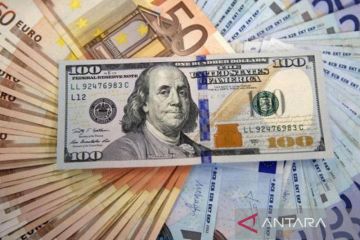 Ketegangan Ukraina kekang euro, picu serbuan ke mata uang aman