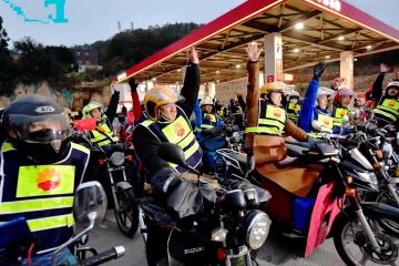 Jumlah migran China yang mudik dengan sepeda motor kini menurun