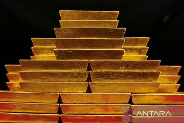Emas tergelincir 5,5 dolar tertekan dolar AS yang lebih kuat