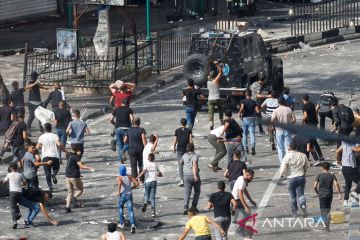 Polisi Palestina dan kelompok bersenjata bentrok, satu tewas