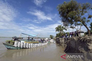 Erosi Sungai Padma mengikis tempat tinggal dan lahan di Distrik Munshiganj