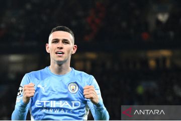 Pep Guardiola berharap Phil Foden bertahan di City lebih lama