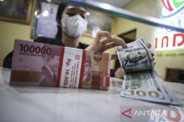 Rupiah menguat tipis, The Fed buka kemungkinan suku bunga naik