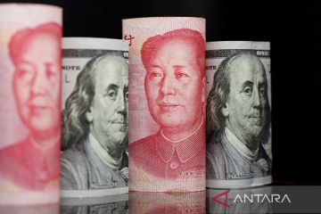 Yuan tergelincir 11 basis poin menjadi 7,1587 terhadap dolar AS