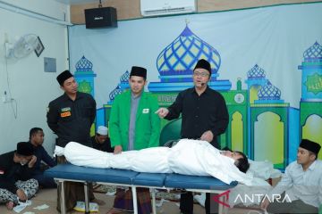 Pekerja migran Indonesia belajar pemulasaraan jenazah secara Islami