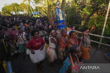 Tradisi Perarakan patung Bunda Maria di Agats