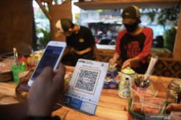 Satu pasar rakyat Pekanbaru menerapkan pembayaran melalui QRIS