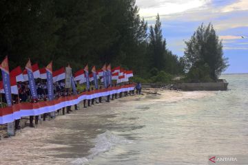 Pengibaran bendera Merah Putih di perbatasan RI - Palau