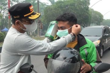 Pemkot Palangka Raya bagikan 5.000 masker bagi pengendara