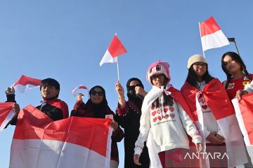 Aksi pendukung timnas Indonesia di Piala Asia 2024