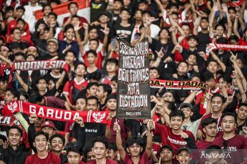 Antusiasme suporter timnas Indonesia pada laga lawan Vietnam