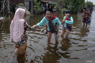 Merayakan Lebaran di tengah kepungan banjir